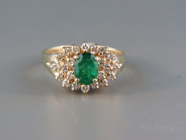 Appraisal: Emerald and Diamond Ring rich oval carat gem surrounded by