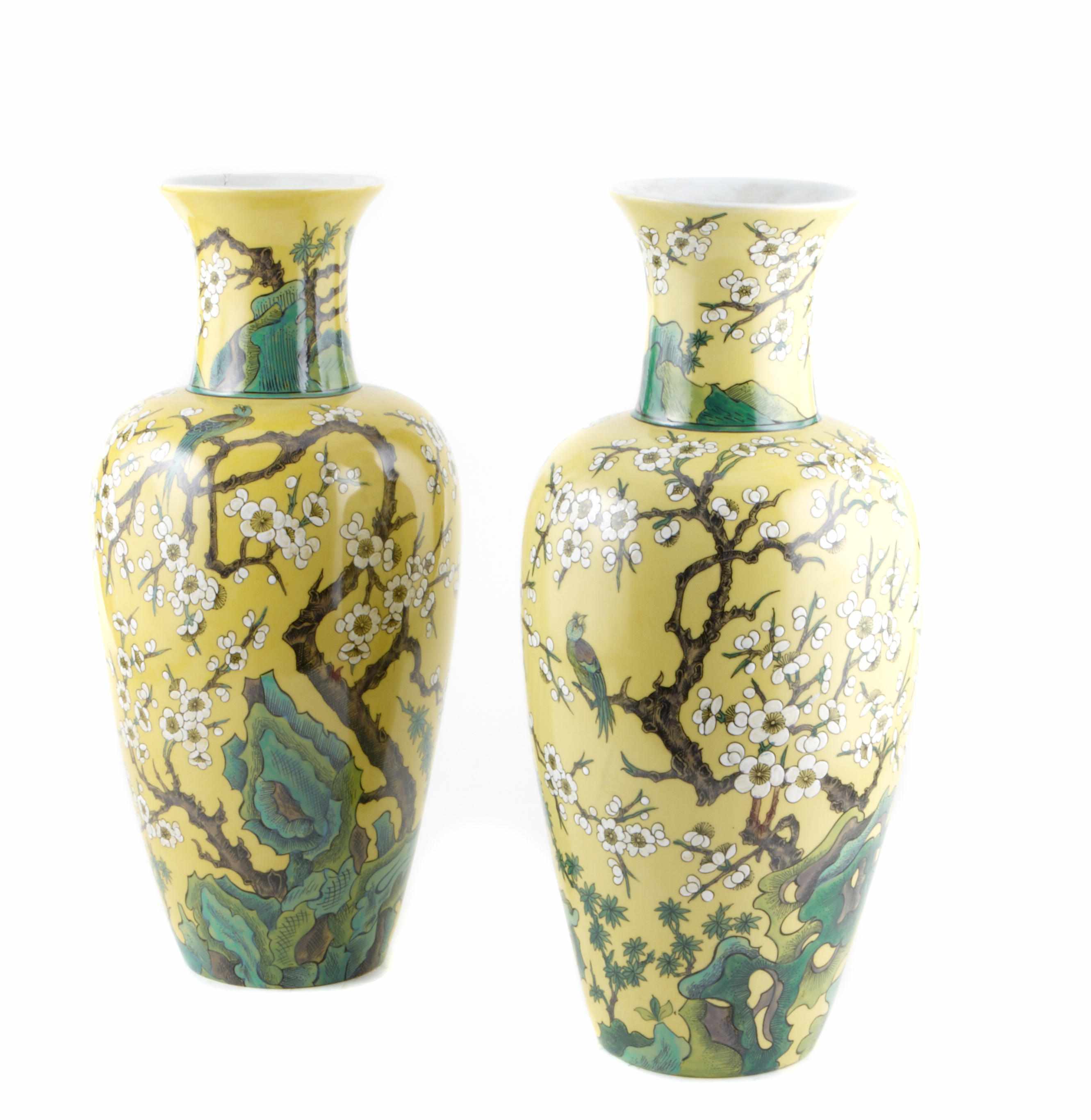 Appraisal: A pair of Chinese yellow porcelain ovoid vases decorated with