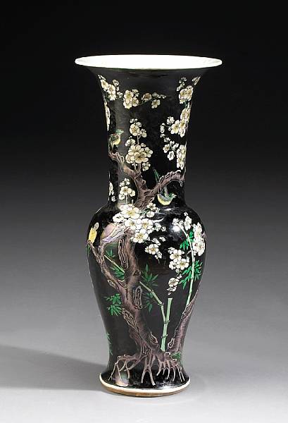 Appraisal: A famille noire enameled porcelain vase th Century Of yenyen