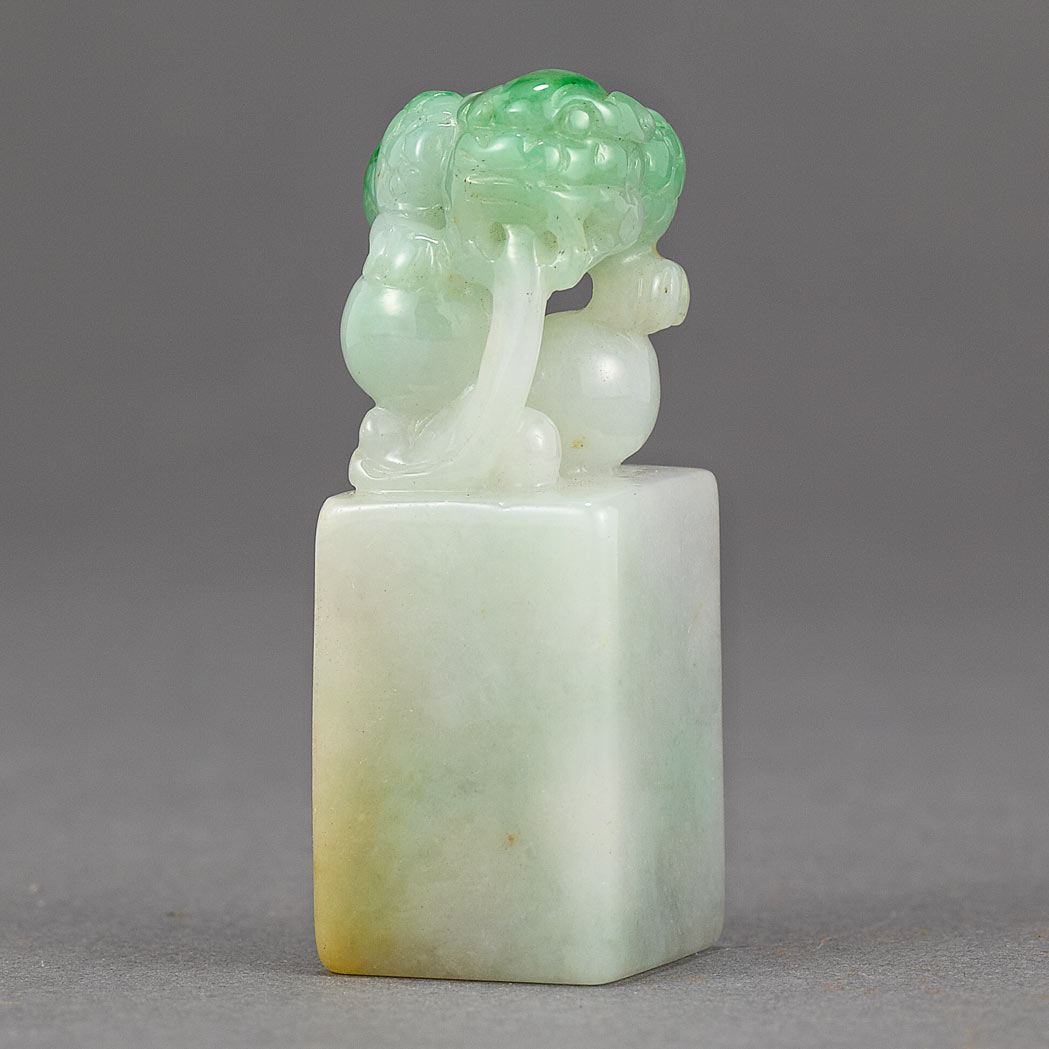 Appraisal: Chinese Jadeite Seal The finial carved in high relief depicting