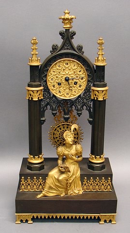 Appraisal: Portal with pointed arch circular ormolu dial works with strike