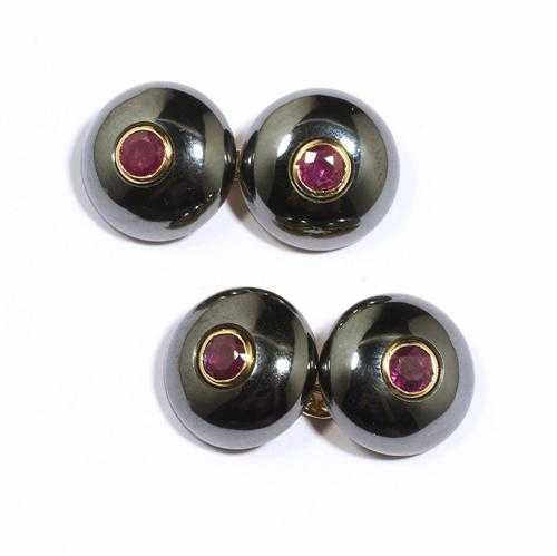 Appraisal: HEMATITE RUBY AND GOLD CUFF LINKS POIRAY Yellow gold Round