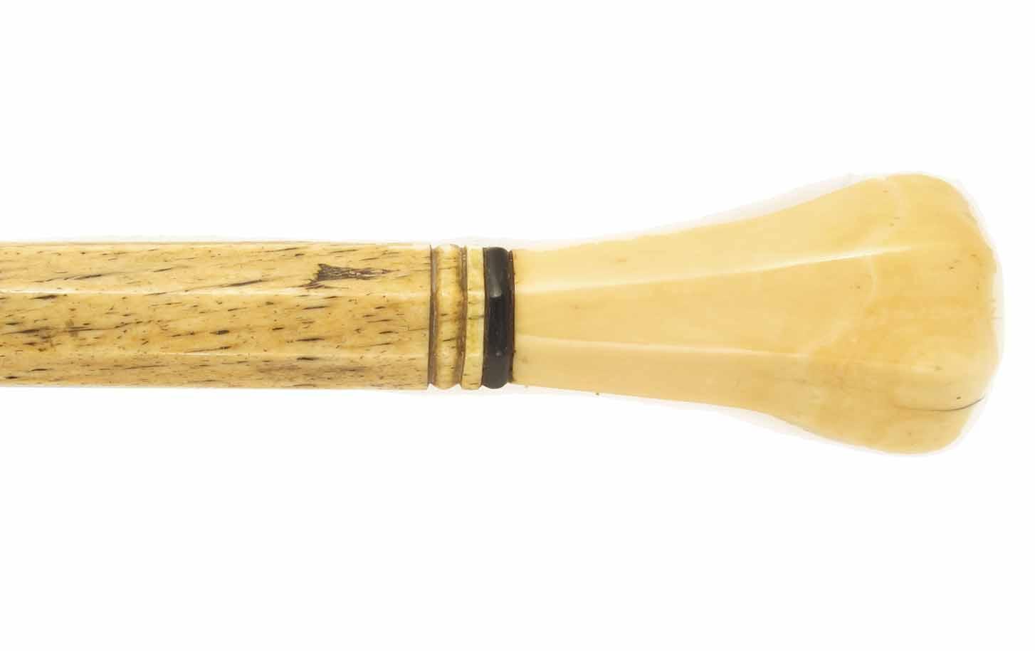 Appraisal: A mid th century sailors scrimshaw walking cane