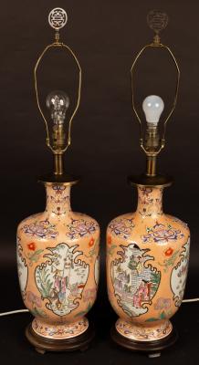 Appraisal: A pair of Oriental style vases decorated Oriental scenes on