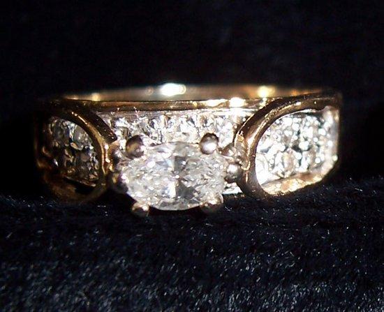 Appraisal: A diamond ring in a stylised setting on an unhallmarked