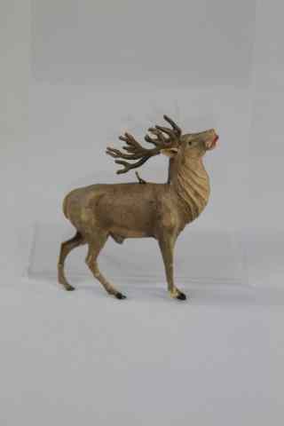 Appraisal: EARLY DRESDEN REINDEER ORNAMENT Germany warm natural coloring very realistic