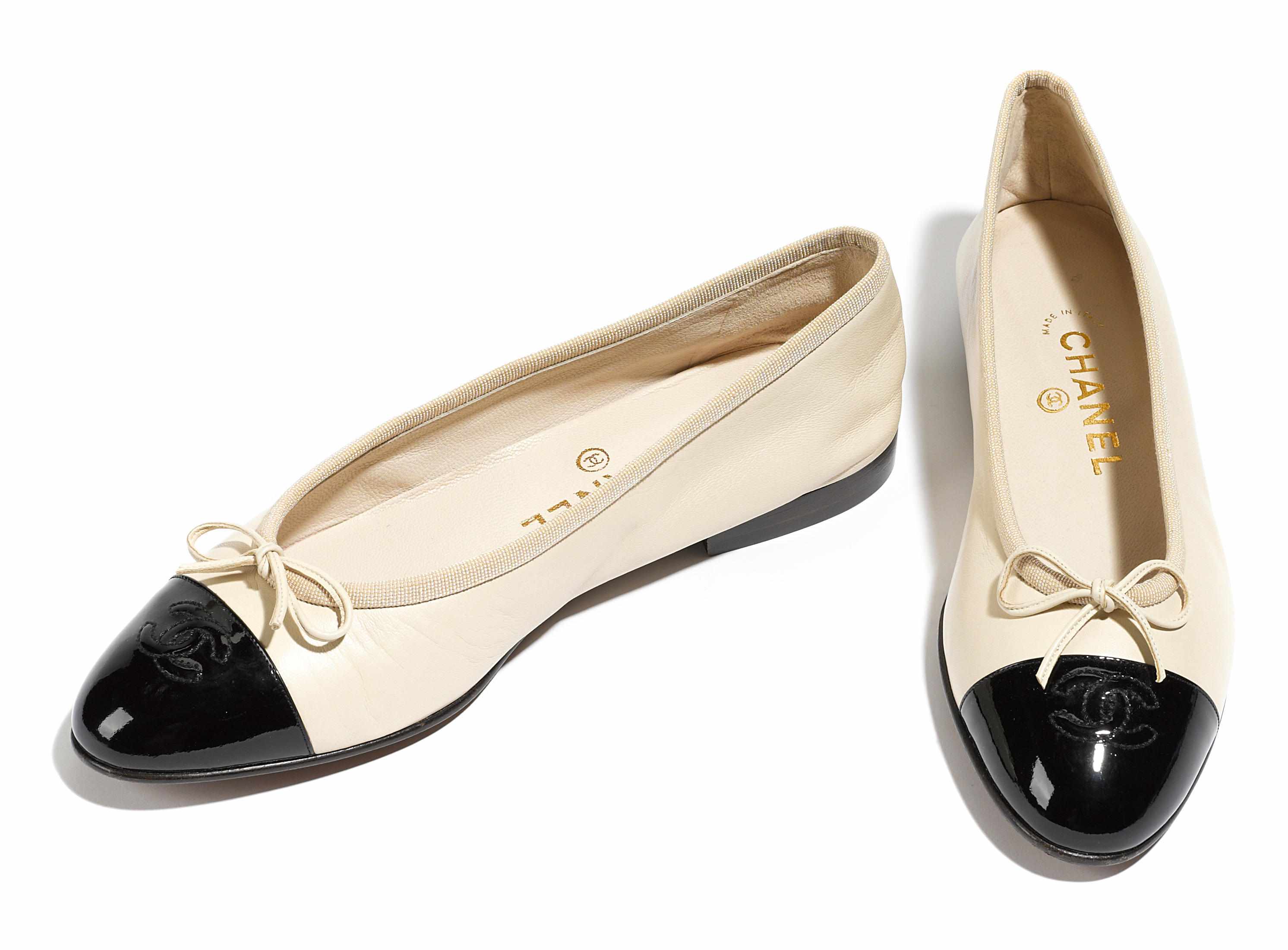 Appraisal: A pair of Chanel embroidered black and beige leather pumps