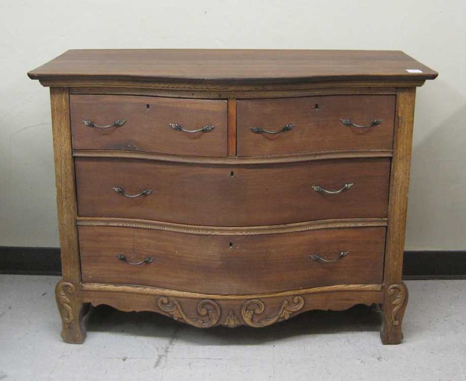 Appraisal: LATE VICTORIAN DRESSER American c having a -drawer serpentine front