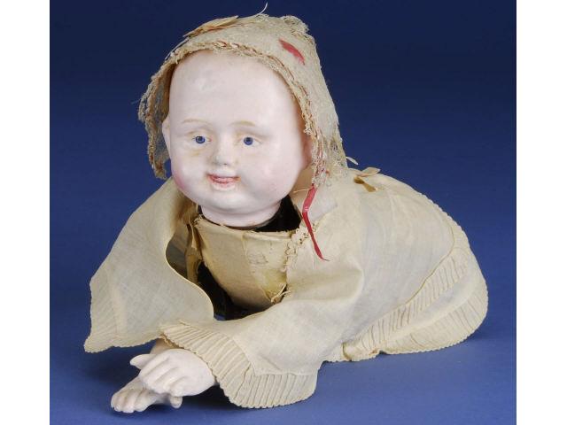 Appraisal: Ives Creeping Baby Mechanical Doll America ca molded composition head