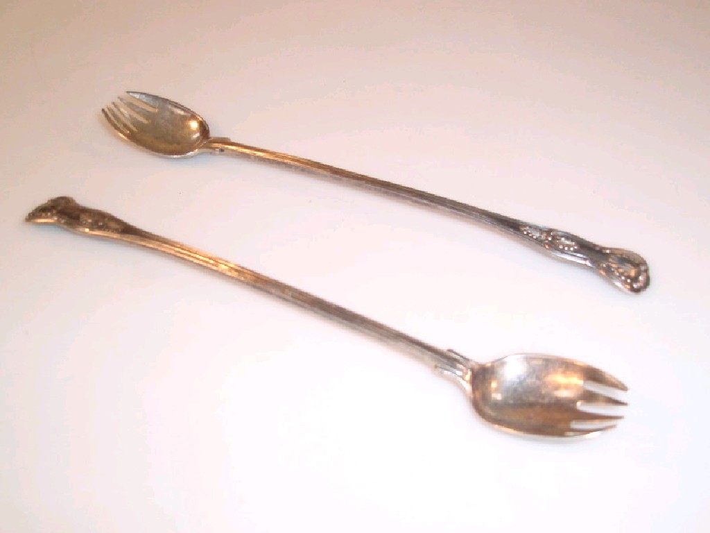 Appraisal: A pair of Victorian silver Kings pattern servers with forked