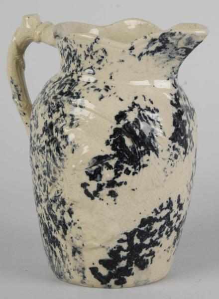 Appraisal: European Stoneware Blue Spongeware Pitcher Description Circa With raised Roman