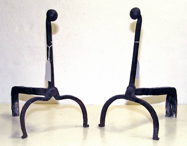 Appraisal: A pair of American wrought iron gooseneck andirons th century