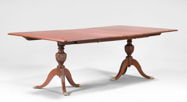 Appraisal: Regency-Style Mahogany Double-Pedestal Banquet Table each section with a vasiform