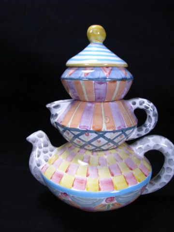 Appraisal: MacKenzie-Childs Artist Decorated Porcelain Stacking Teapot four piece creamer sugar