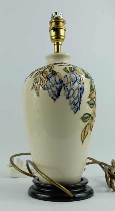 Appraisal: Moorcroft lampbase decorated in the Wisteria design with brass fitment