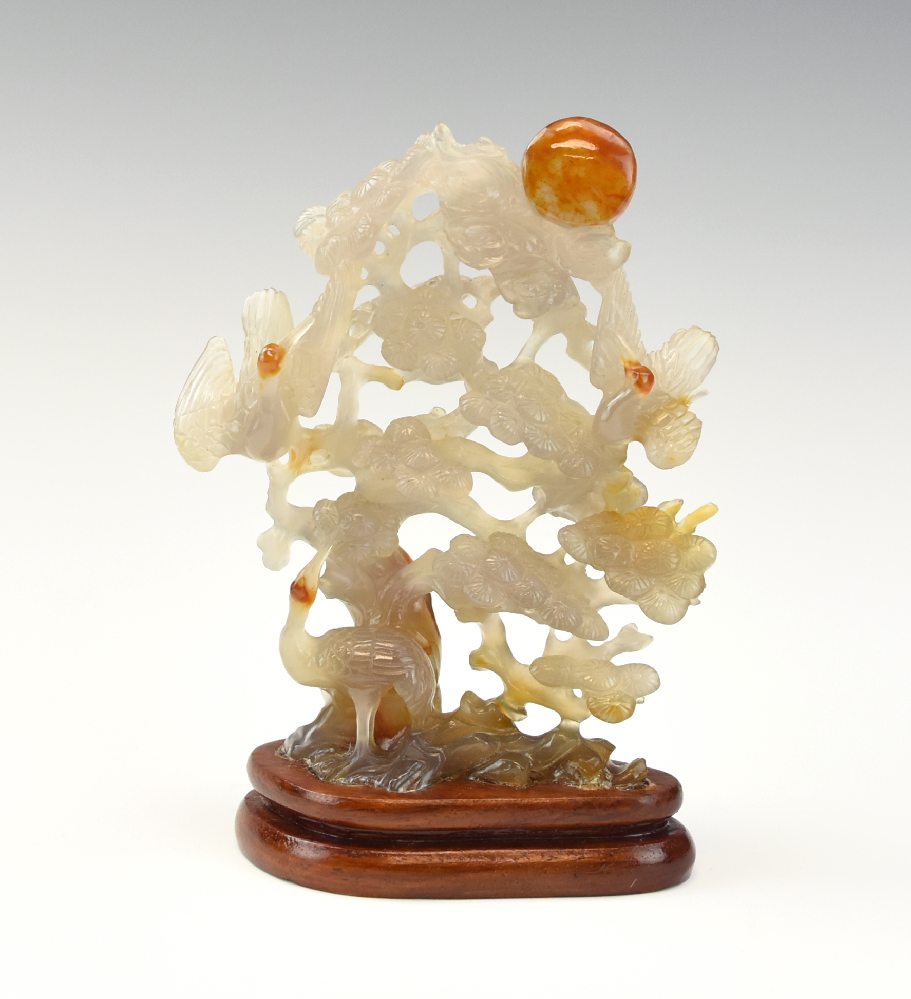 Appraisal: CHINESE AGATE CARVING OF PINE TREE AND CRANE comprising an