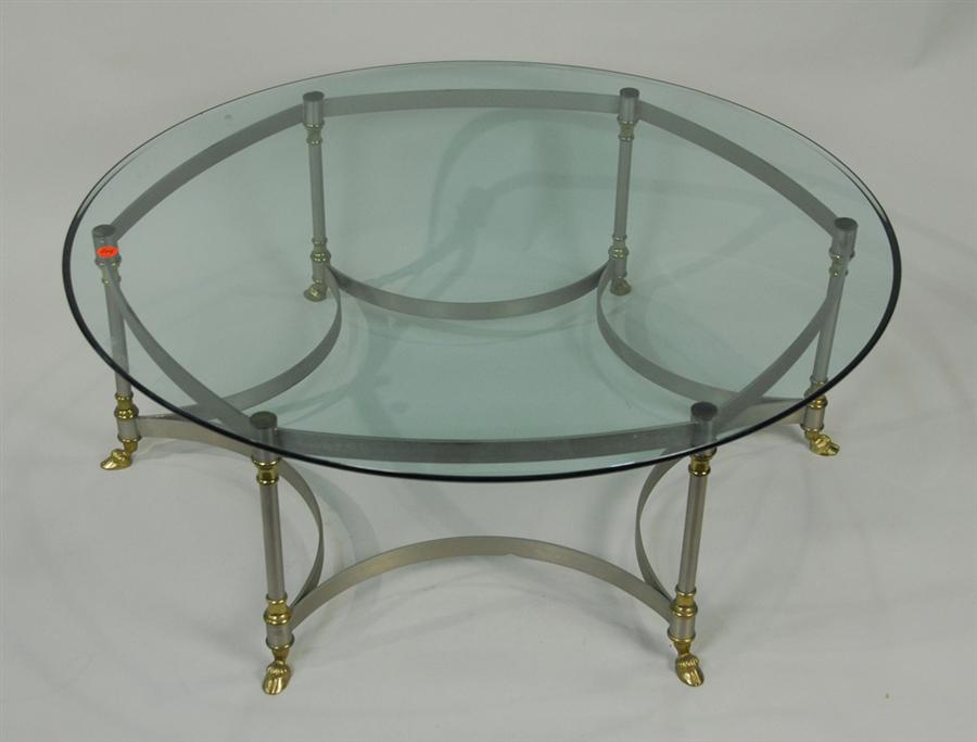 Appraisal: CIRCULAR GLASS TOP IRON AND BRASS COFFEE TABLE height inches