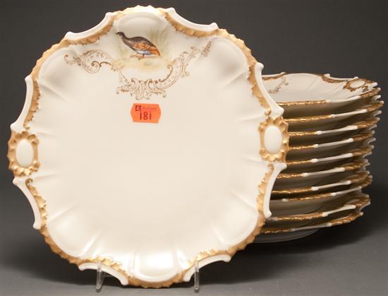 Appraisal: Set of eleven Limoges painted transfer parcel-gilt porcelain game plates