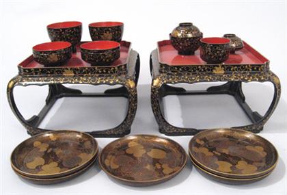 Appraisal: Pair of Japanese lacquered tea stands and cups and five