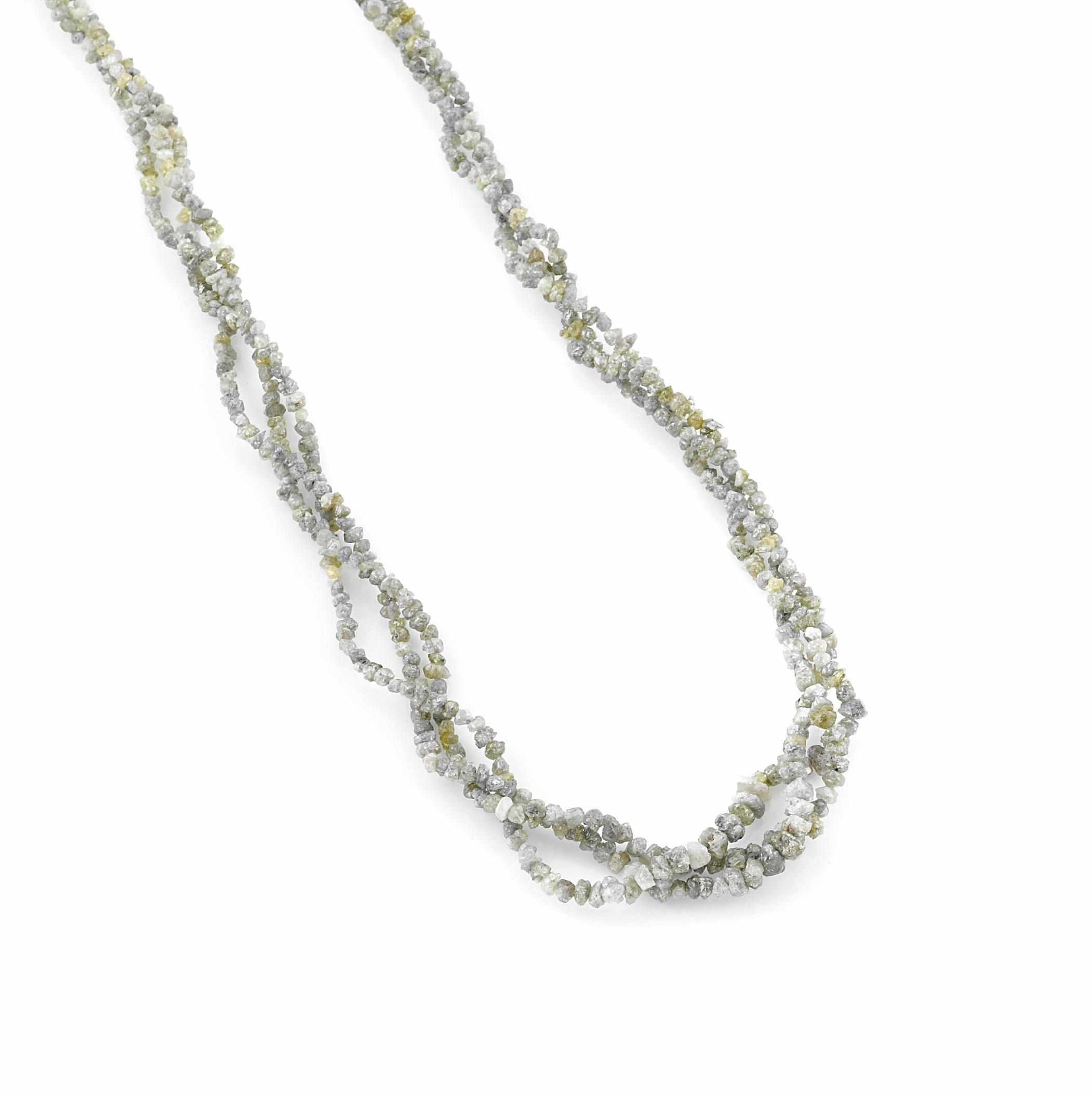 Appraisal: A rough colored diamond and karat gold necklace triple strand