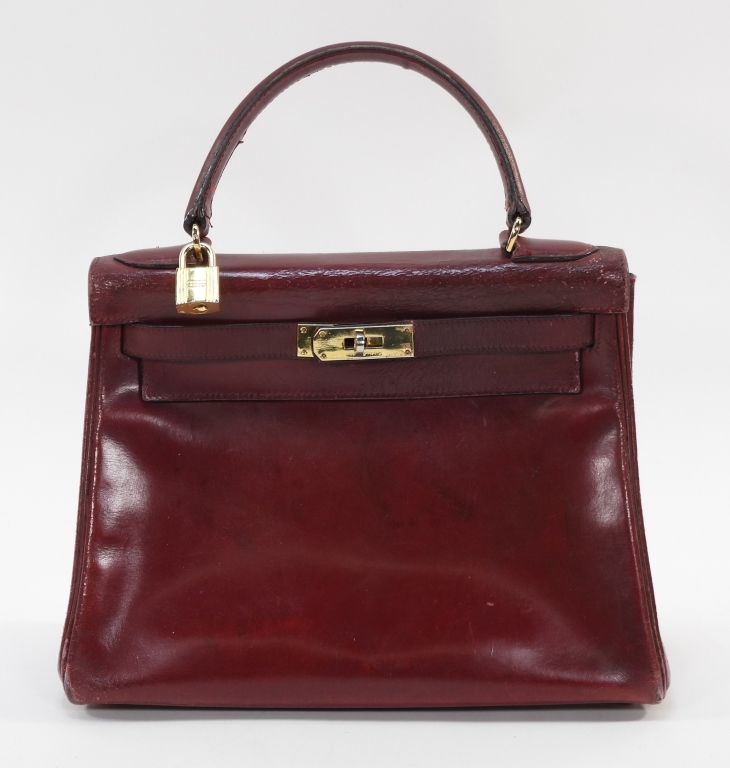 Appraisal: GUARANTEED AUTHENTIC HERMES ROUGE H KELLY BAG France th CenturyHermes