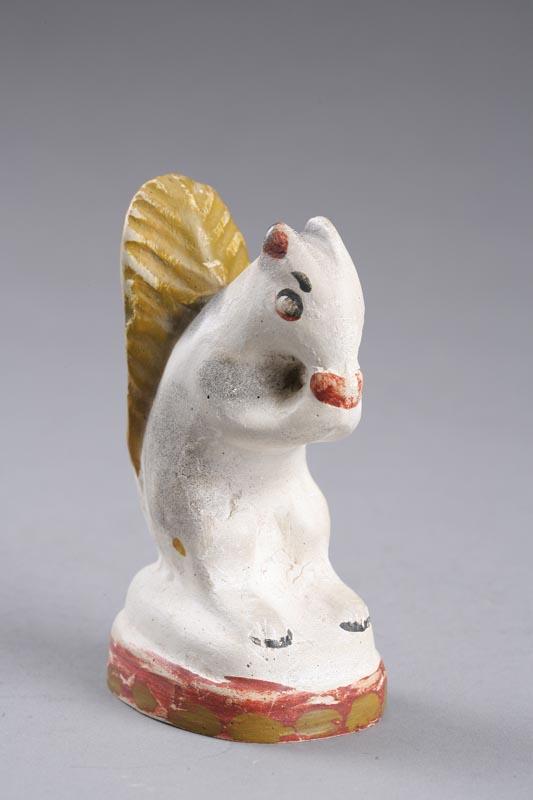 Appraisal: CHALK SQUIRREL American nd half- th century Squirrel eating a