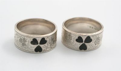 Appraisal: A pair of silver and hardstone napkin rings by J