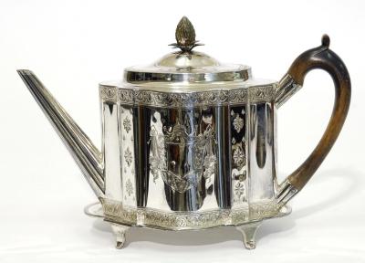 Appraisal: A GEORGIAN TEAPOT of shaped oval form with straight reeded