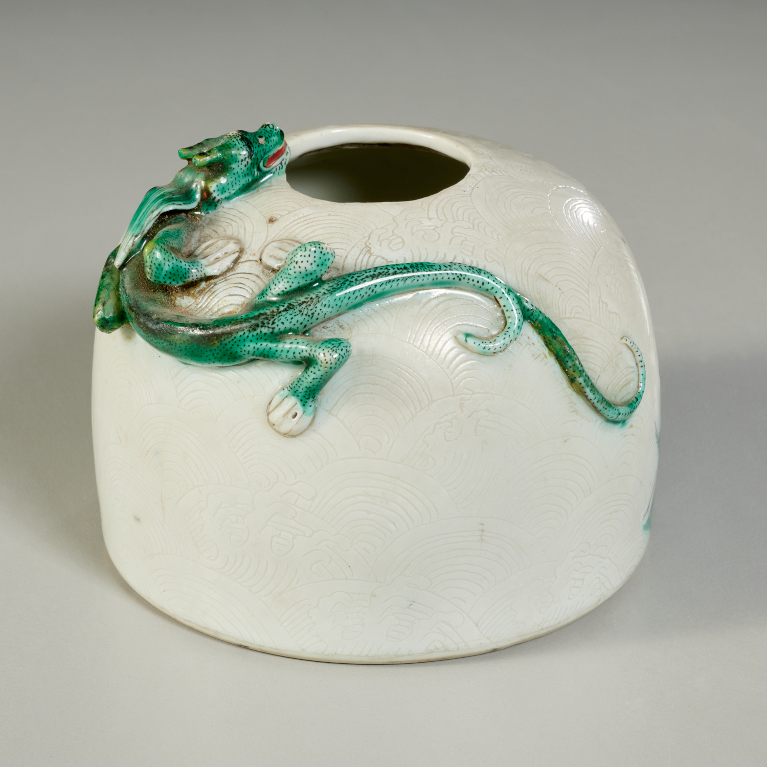 Appraisal: CHINESE SGRAFFITO WATER POT WITH APPLIED DRAGON Possibly Qianlong Era