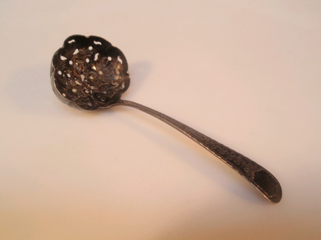 Appraisal: A George IV silver sifter spoon with floral embossed and