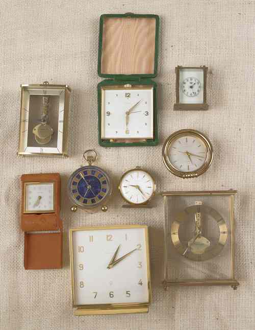 Appraisal: Nine assorted brass desk and travel clocks to include three