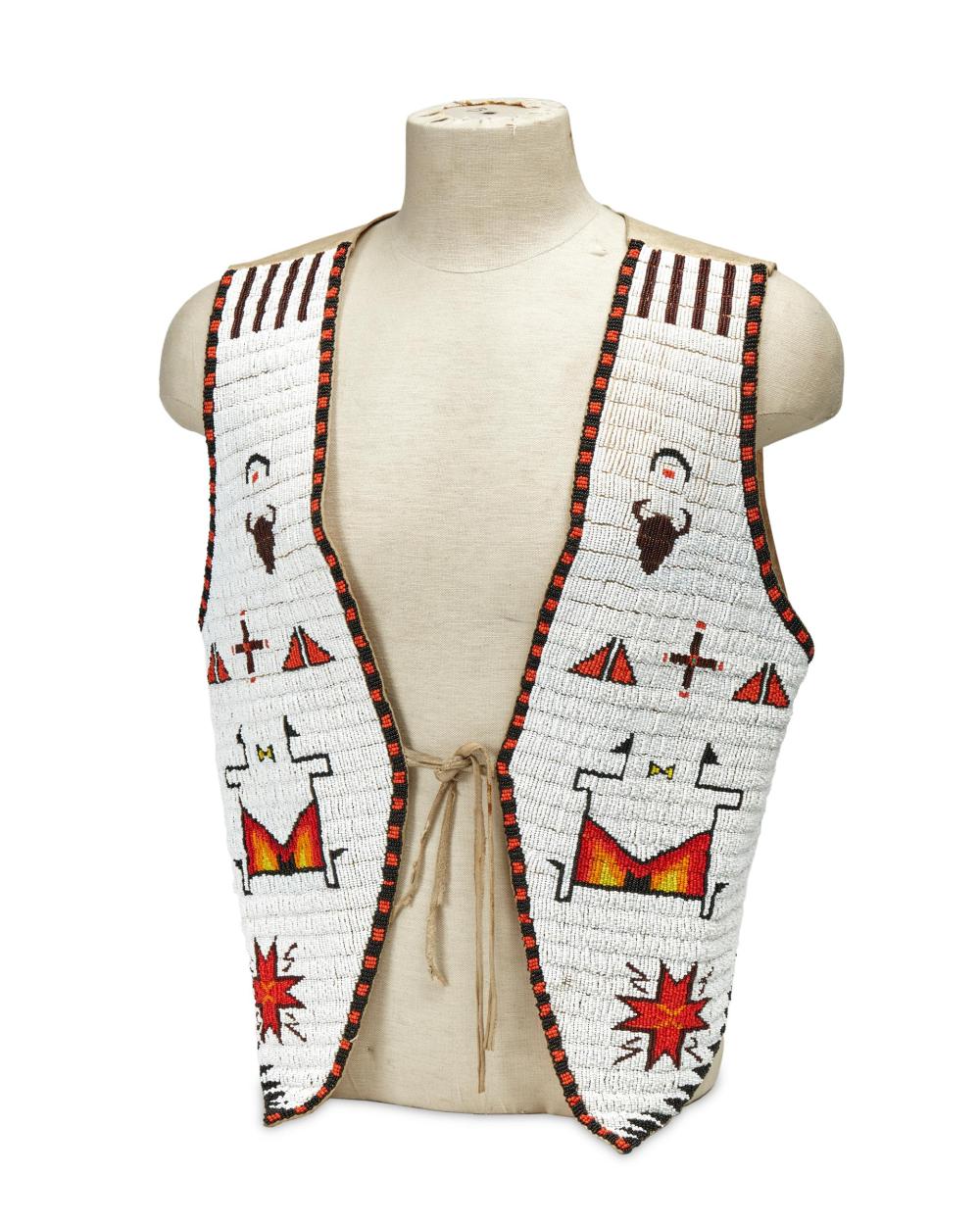 Appraisal: A Sioux beaded hide vest by Archie Burnett Fourth-quarter th