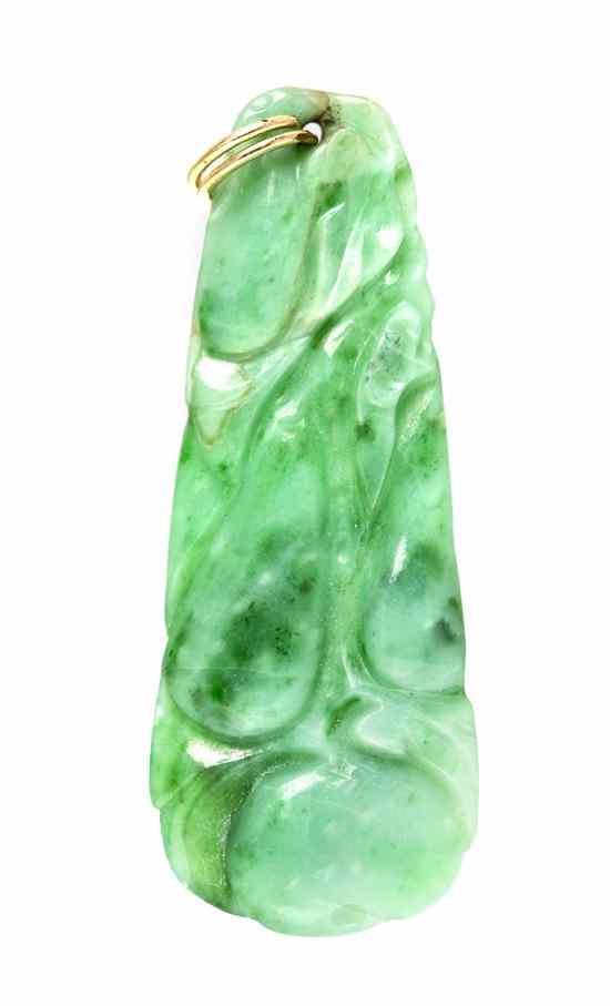 Appraisal: A Jade Pendant of apple green hue and tapering form