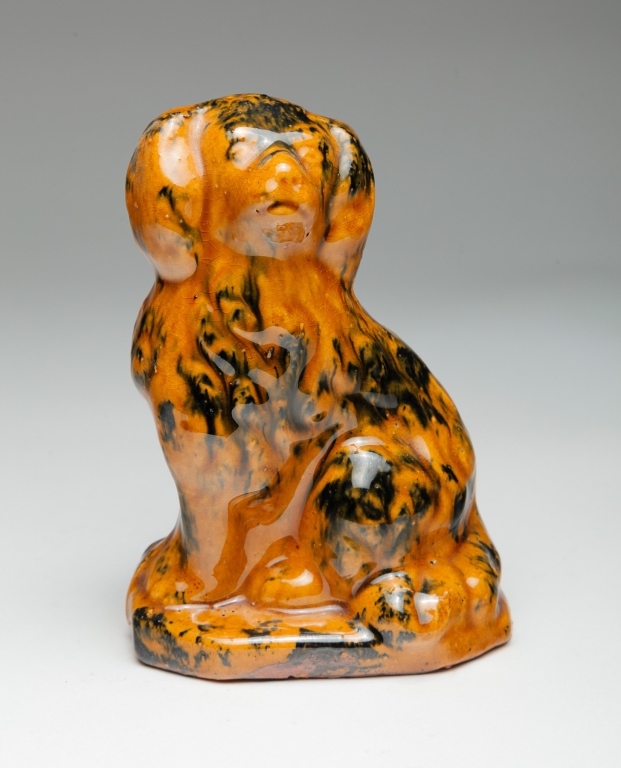 Appraisal: Second half- th century Pale orange glaze with manganese sponged