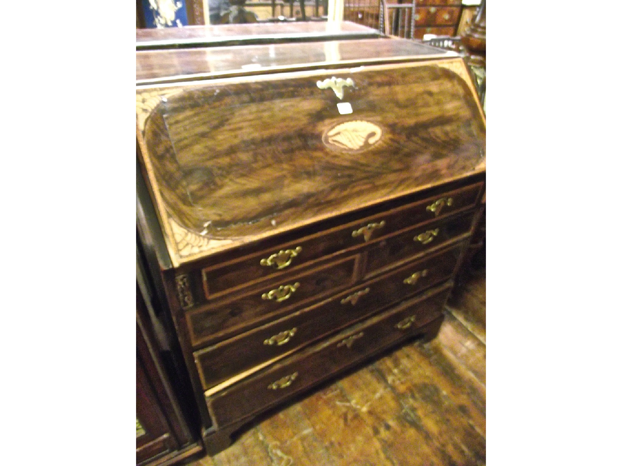 Appraisal: A Georgian mahogany chest of three long and two short