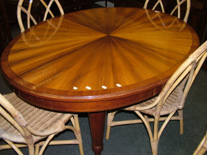 Appraisal: A French walnut and mahogany oval dining table th century