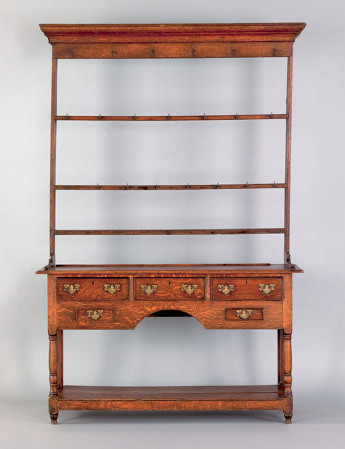 Appraisal: Welsh oak pewter cupboard with open top and five drawer