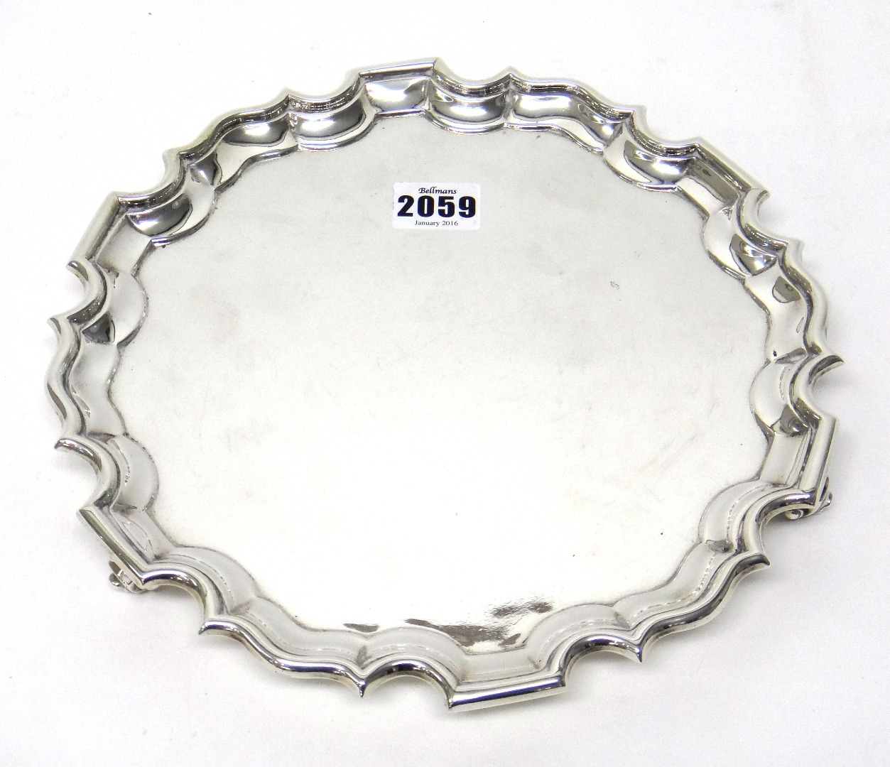 Appraisal: A silver salver of shaped circular form in the Chippendale