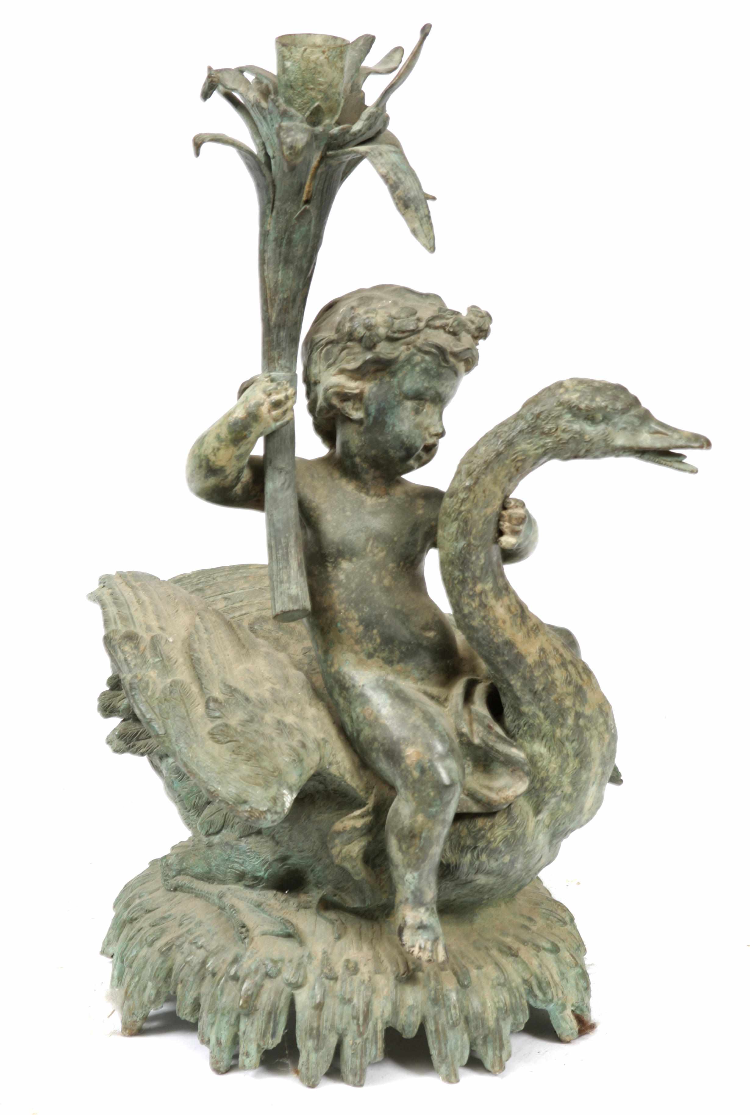 Appraisal: A Luciano bronze figural candlestick Together with a figural bronze