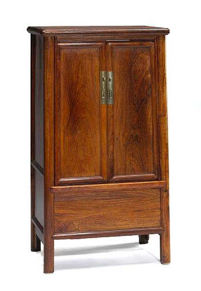 Appraisal: A huanghuali tapered cabinet Late Qing Republic Period Constructed with