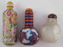 Appraisal: A Chinese milk glass snuff bottle with blue and red