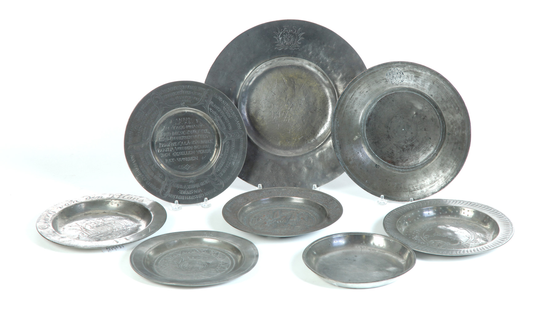 Appraisal: EIGHT PLATES AND CHARGERS Seventeenth- th century European pewter except