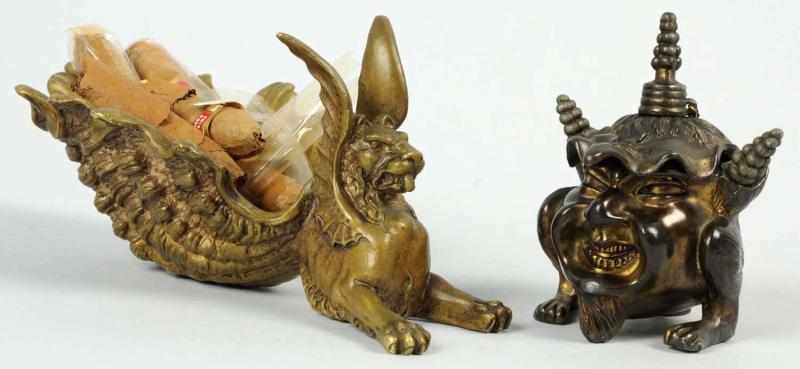 Appraisal: Lot of Pot Metal Figural Tobacco Pieces Includes one winged