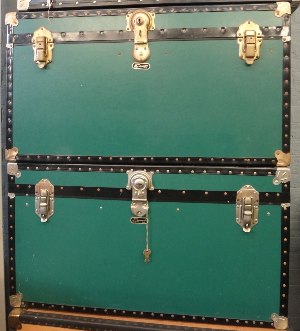 Appraisal: A pair of Mossman London green fibre trunks with studded