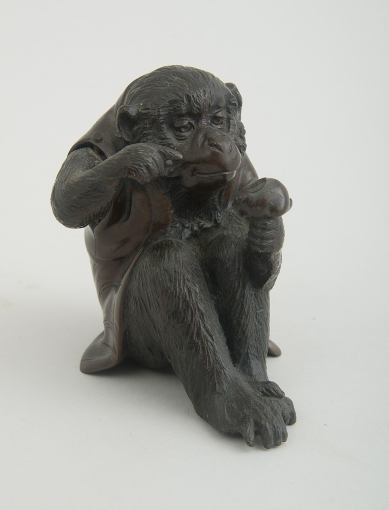 Appraisal: JAPANESE BRONZE FIGURE OF A SEATED SNOW MONKEY Unmarked modeled