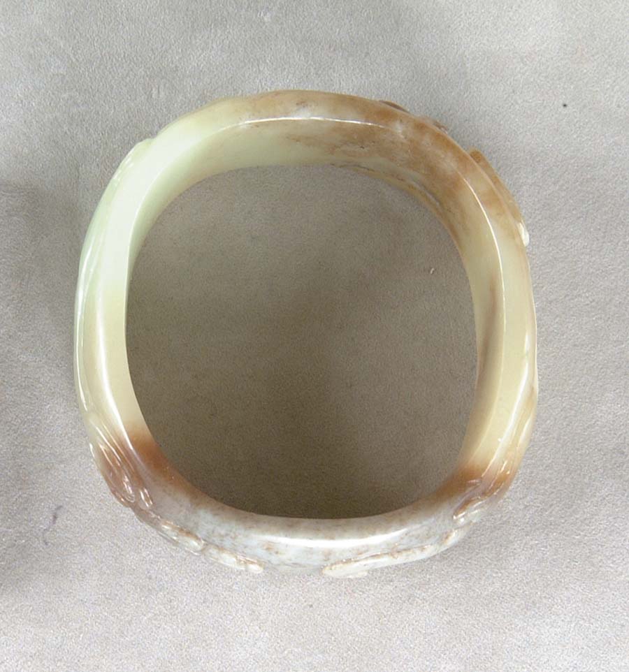 Appraisal: CARVED JADE BRACELET Wonderful bangle bracelet is carved from a