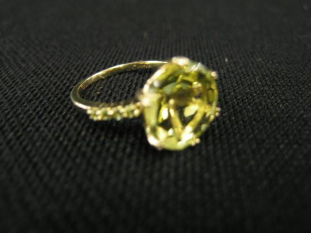 Appraisal: Lemon Topaz Ring carat round gem with peridots on each