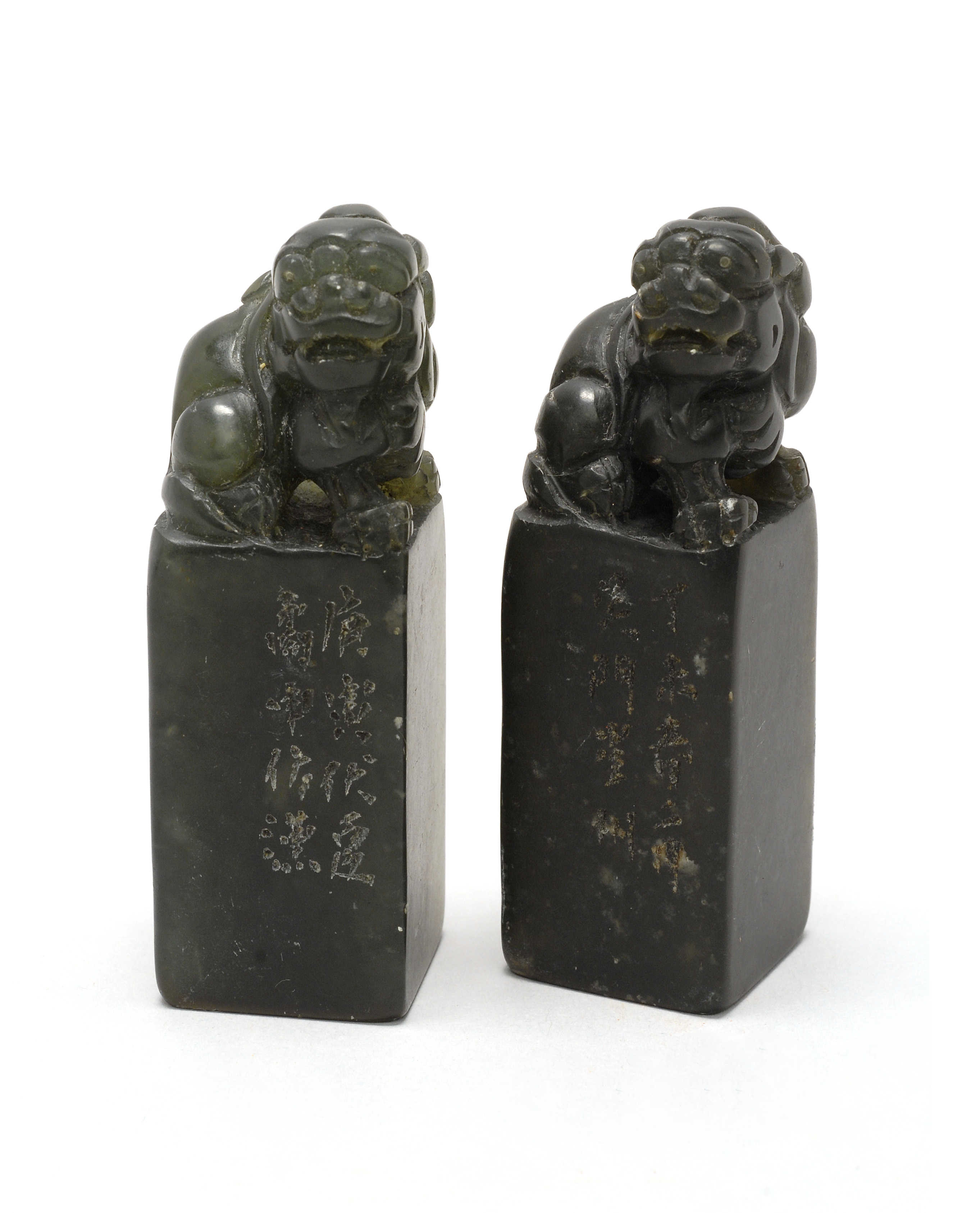 Appraisal: TWO DARK GREEN STONE SEALS In rectangular form with lion