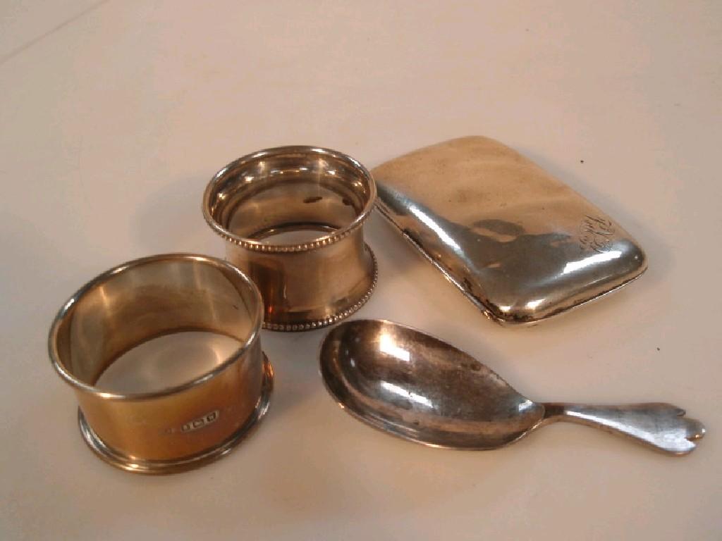 Appraisal: A George V silver caddy spoon Sheffield with an oval