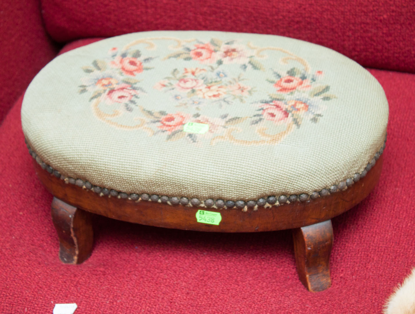 Appraisal: Needlepoint covered foot stool